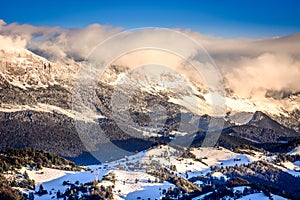 The Carpathians Bucegi Mountains Romania landscape winter snow ice clouds sunlight morning