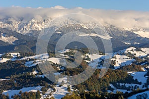 The Carpathians Bucegi Mountains Romania landscape winter snow ice clouds sunlight morning