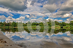 Beautiful scenery of the nature of the Ukrainian forest and rivers on a summer evening