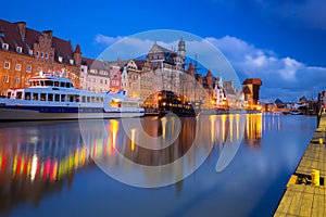 Beautiful scenery of the old town in Gdansk over Motlawa river at dawn, Poland