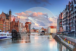 Beautiful scenery of the old town in Gdansk over Motlawa river at sunrise, Poland