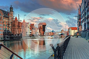 Beautiful scenery of the old town in Gdansk over Motlawa river at sunrise, Poland