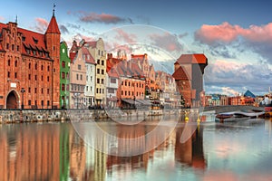 Beautiful scenery of the old town in Gdansk over Motlawa river at sunrise, Poland