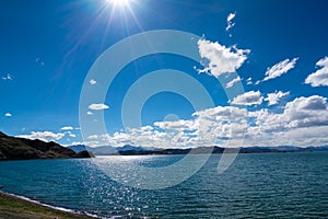 Beautiful scenery of Pangong Tso lake with  blue sky  white clouds in China side