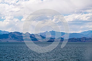 Beautiful scenery of Pangong Tso lake with  blue sky  white clouds in China side