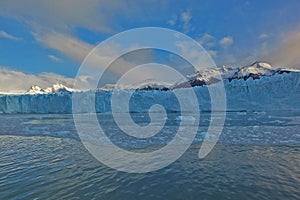 Beautiful scenery of Perito Moreno glacier view from water in the morning autumn sunrise Argentina