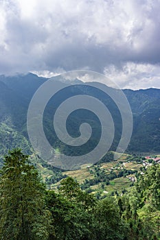 Beautiful scenery, popular tourist trekking destination. Rice field terraces.  Mountain view in the clouds.