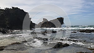 Beautiful scenery of rock formations near the crazy sea waves