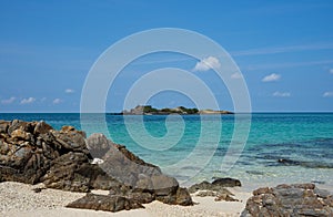 The beautiful Scenery of rock on the White sand beach with clear blue sea in blackground during summer season at Samaesarn Island