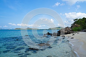 The beautiful Scenery of rock on the White sand beach with clear blue sea in blackground during summer season at Samaesarn Island