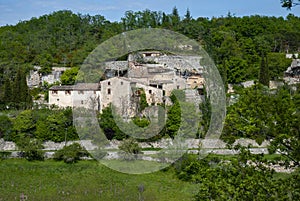 Beautiful scenery of run-down farmhouses cling to a hill in Provence