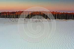 Beautiful scenery of sand dunes in the Slowinski National Park at sunset, Leba. Poland