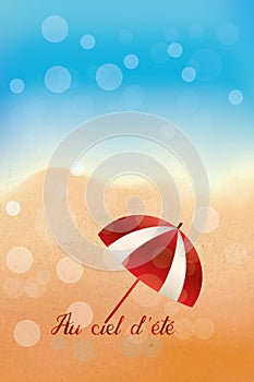 Beautiful scenery with sandy beach under the summer sky with French mention and umbrella