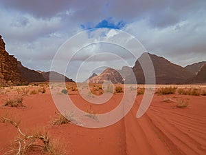 Beautiful Scenery Scenic Panoramic View Red Sand Desert and Ancient Sandstone Mountains Landscape in Wadi Rum, Jordan