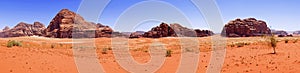 Beautiful Scenery Scenic Panoramic View Red Sand Desert and Ancient Sandstone Mountains Landscape in Wadi Rum, Jordan