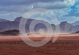 Beautiful Scenery Scenic Panoramic View Red Sand Desert and Ancient Sandstone Mountains Landscape in Wadi Rum, Jordan during a San