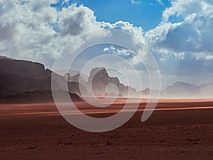 Beautiful Scenery Scenic Panoramic View Red Sand Desert and Ancient Sandstone Mountains Landscape in Wadi Rum, Jordan during a San