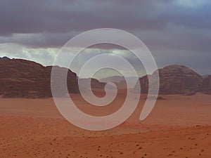Beautiful Scenery Scenic Panoramic View Red Sand Desert and Ancient Sandstone Mountains Landscape in Wadi Rum, Jordan during a San