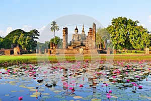 Beautiful Scenery Scenic View Ancient Buddhist Temple Ruins of Wat Mahathat in The Sukhothai Historical Park in Summer photo