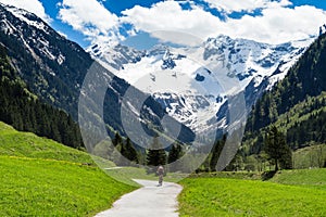 Beautiful scenery of Stiluptal on a sunny day with mountain peaks in the background. Stilluptal, Austria, Tyrol photo