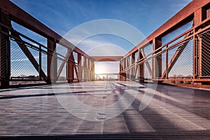 Beautiful scenery of sun rays shining through a bridge in Winston Salem, North Carolina