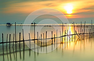 Beautiful scenery of sunrise in the morning at Bangtaboon Bay,Phetchaburi,Thailand