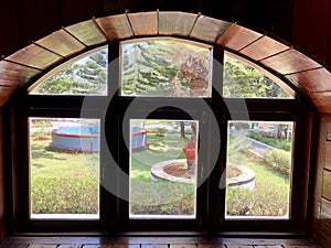 Beautiful scenery view of garden through the window