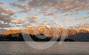 Beautiful scenery view of the Remarkables mountain in Queenstown, New Zealand at sunset.