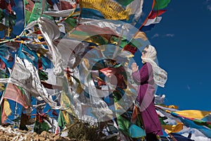 The Beautiful Scenery: Woman and Prayer Flags