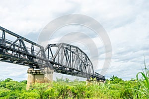 Beautiful scenic of black steel railway bridge across the river