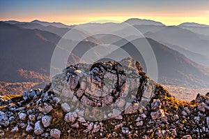 Beautiful scenic golden autumn HDR landscape of mountain rock at sunset. Stone nature background, Chernogor Mount, West Caucasus,