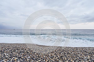 Beautiful scenic of ocean with sprawling stone covered beach