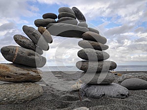 Beautiful scenic of ocean with sprawling stone covered beach at Qixingtan beach recreation area in Hualien city, Taiwan