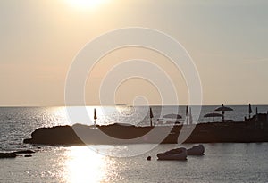 Beautiful scenic of Punta della suina beach at sunset in Salento, Italy, important traveling destination of ionian sea