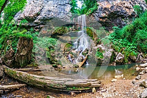 Beautiful scenic summer landscape of Universitetskiy waterfall in Caucasus mountains by Mezmai village