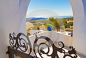 Beautiful scenic view through arch at Pyrgos Kallistis Santorini