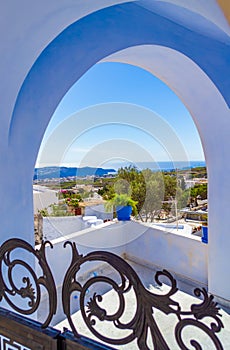 Beautiful scenic view through arch at Pyrgos Kallistis Santorini