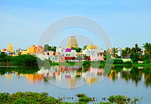 Beautiful scenic view of sacred city Kanchipuram Kanchi with colorful traditional houses and gopura of Hindu Temple