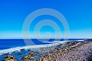 Beautiful scenics of Jialulan rocky beach by the waves combine with the breeze and the sky in Taitung city