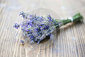 Beautiful scented lavender flowers bouquet on the wooden table