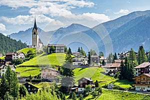 Beautiful Schmitten village at Albula pass in Grisons, Graubuenden, Switzerland photo