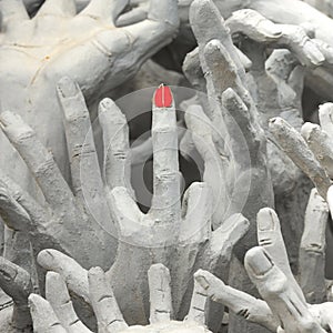 Beautiful sculpture Ghost hands from hell in white temple, Chian