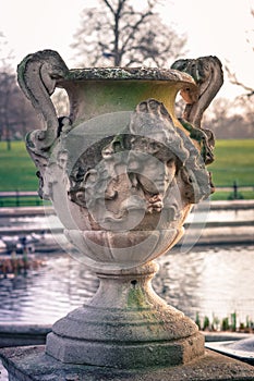 A beautiful sculptured vase in the Italian Garden in Kensington Gardens, London.