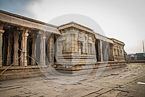 Side entrance of the Stone chariot vitala temple main attraction at hampi, karnataka, india photo