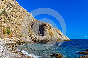 Beautiful sea bay among the rocks on a sunny summer day