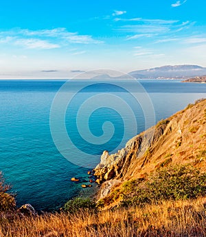 Beautiful sea bay among the rocks on a sunny summer morning