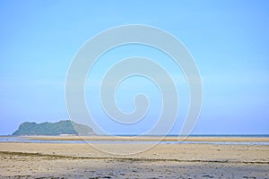 A beautiful sea beach with water waves and a horizontal line,blue sky in bright day