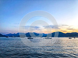 Beautiful sea view, sailboats far away in the sea in sunny day, natural background, amazing summer adventure