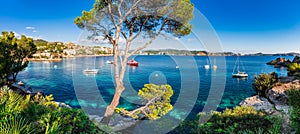 Beautiful sea view scenery of bay with boats on Majorca island, Spain.