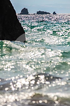 Beautiful sea wave crashing on rock coast